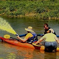 Students work in a pond.